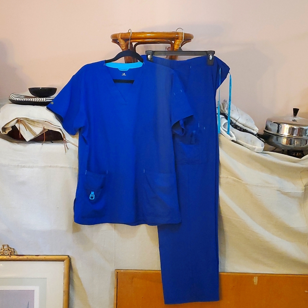 Royal blue nurses scrubs by Carhartt, size L